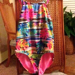 Little girls swimsuit pink and all kinds of different colors.